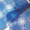 crochet scarf of blue daisies