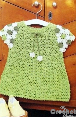 green dress with floral sleeves photo