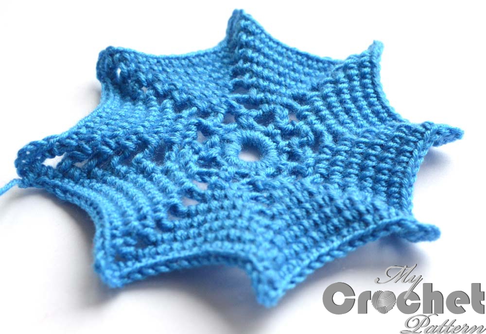 blue spider web crochet pattern close photo 2