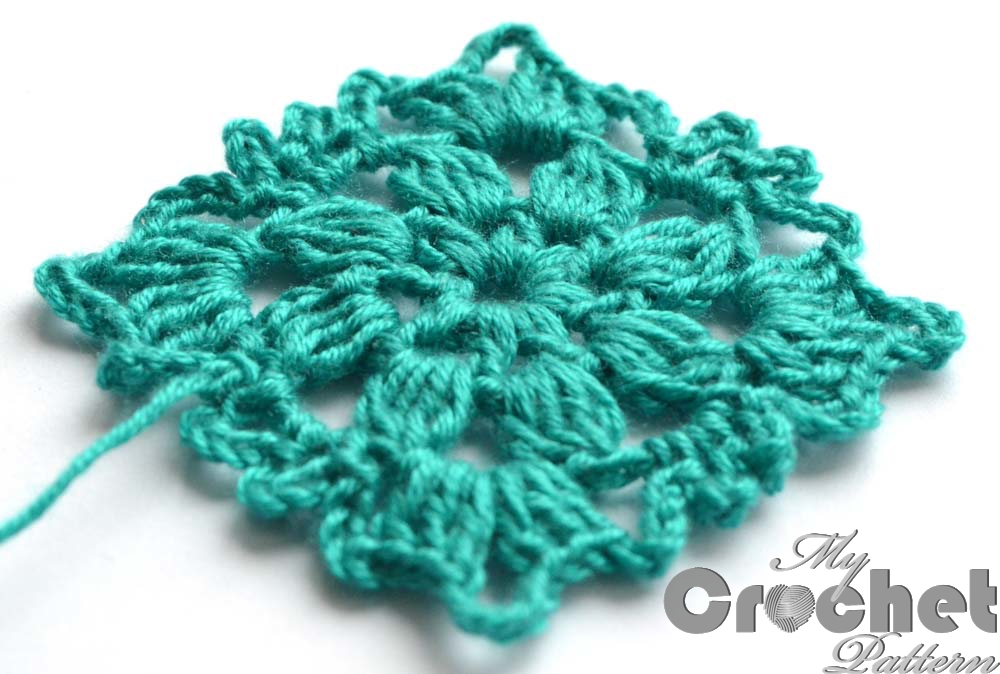 blue square flower motif close photo blue square flower motif close photo