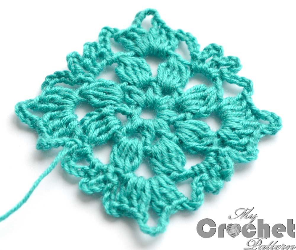 blue square flower motif close photo 2