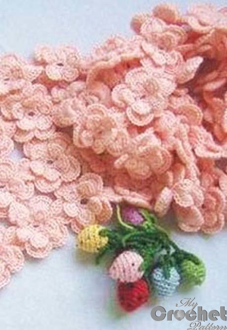 pink crochet scarf with small flowers photo