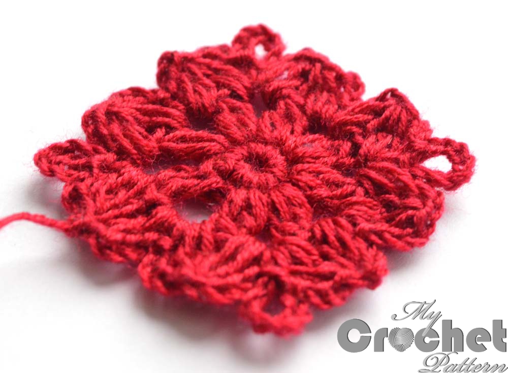 red crochet flower thic yarn - close photo red crochet flower thic yarn - close photo