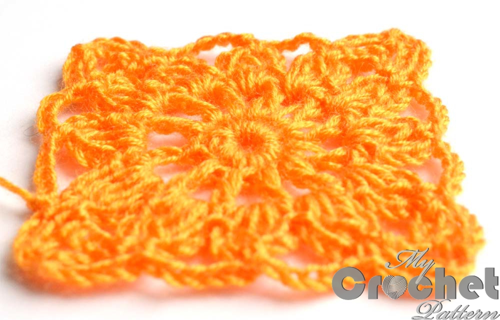 square orange flower motif close photo