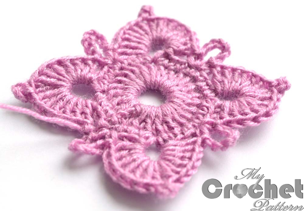 square purple flower motif - close photo