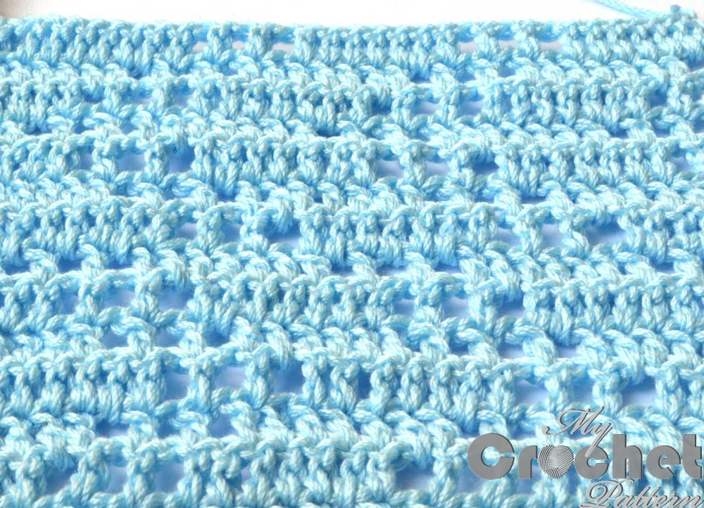 light blue filet crochet pattern - close photo