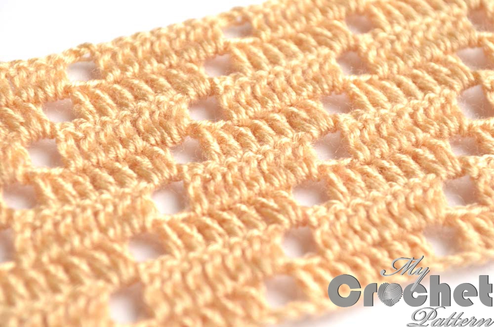 light brown filet pattern with squares - close photo light brown filet pattern with squares - close photo