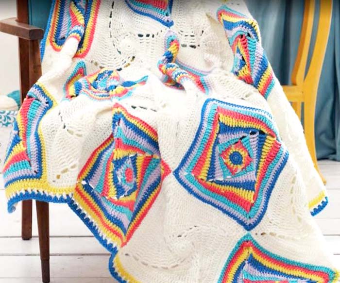 crochet baby blanket with multicolor square motifs - big photo