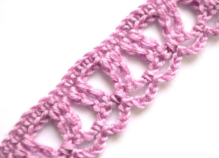 Purple crochet edging pattern with arches