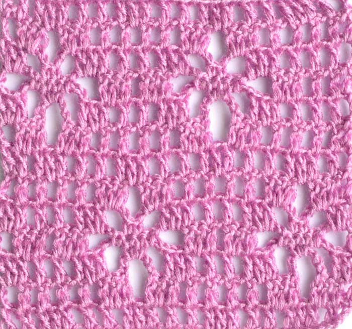 purple filet crochet pattern with flowers